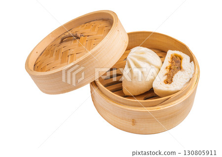 Baozi Bun, Chinese Steamed bun with pork meat in bamboo steamer isolated on white background. top view 130805911