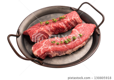 Raw Tri Tip Steak from Black Angus beef meat in stell tray isolated on white background 130805918