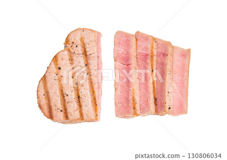 Perfectly cooked grilled tuna steak, a must try for seafood enthusiasts seeking a delicious and nutritious meal. isolated on white background. top view Perfectly cooked grilled tuna steak, a must try for seafood enthusiasts seeking a delicious and nutritious meal. isolated on white background. top view 130806034