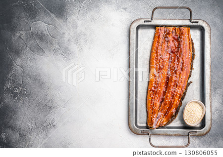 Unagi eel, grilled fish fillet with sauce. grey background. top view 130806055