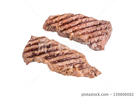 Grilled Denver steak, perfectly seared with beautiful grill marks, showcasing its juicy tenderness and rich flavor. isolated on white background. top view 130806082