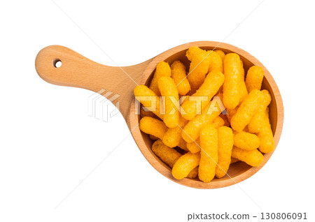 Irresistible Cheese puffs, cheese snacks bursting with bold flavors and a satisfying crunch. isolated on white background. top view Irresistible Cheese puffs, cheese snacks bursting with bold flavors and a satisfying crunch. isolated on white background. top view 130806091
