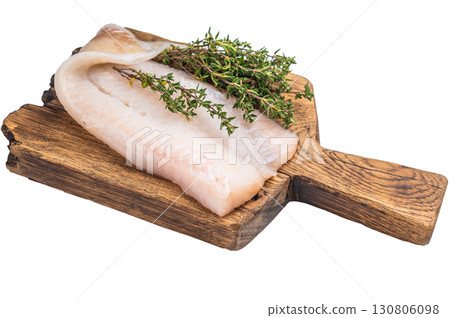Uncooked Atlantic cod fillet, raw fish ready to be seasoned and transformed into a delicious meal. isolated on white background. top view 130806098