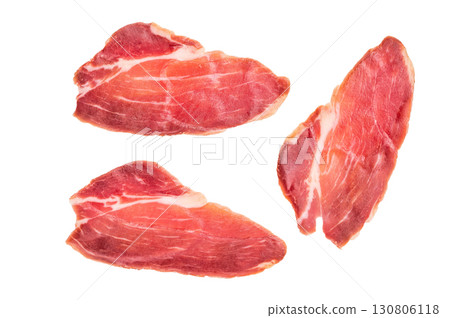 Slices of prsut, Balkan pork meat ham isolated on white background. top view Slices of prsut, Balkan pork meat ham isolated on white background. top view 130806118