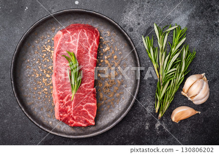 Australian Oyster Top blade steak, Fresh Beef shoulder meat on plate. black background. top view Australian Oyster Top blade steak, Fresh Beef shoulder meat on plate. black background. top view 130806202