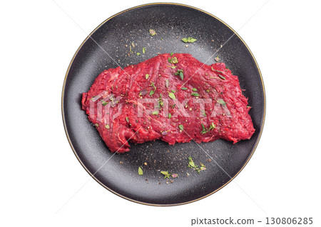 Marinated Flank or Flap steak, raw beef meat with thyme and spices on plate isolated on white background. top view Marinated Flank or Flap steak, raw beef meat with thyme and spices on plate isolated on white background. top view 130806285