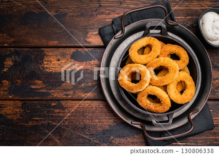 Crispy Fried squid rings, calamari fastfood snack. wooden background. top view 130806338