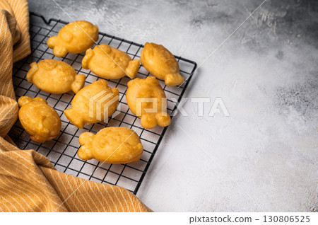 Korean pancake Bungeoppang, Fish shaped Waffle with sweet red bean filling. white background. top view 130806525