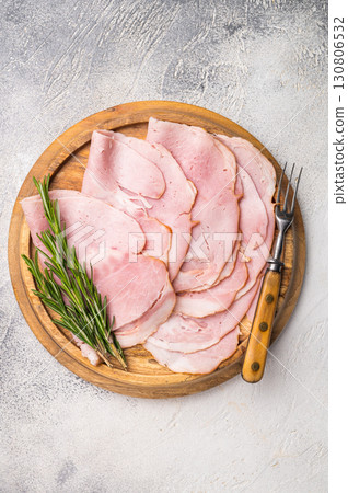 Prosciutto Cotto, Sliced Pork Ham on wooden board. white background. top view 130806532