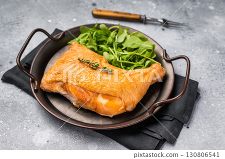 Smoked chicken leg, poultry meat on steel tray. grey background. top view Smoked chicken leg, poultry meat on steel tray. grey background. top view 130806541