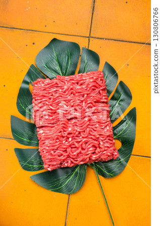 Freah Raw beef and veal ground meat, forcemeat, on kitchen background. 130806766