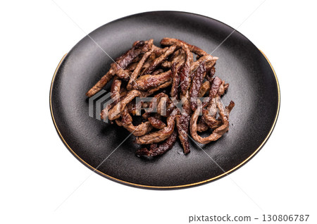 BBQ Fried beef tender strips, sliced steak in a plate isolated on white background BBQ Fried beef tender strips, sliced steak in a plate isolated on white background 130806787