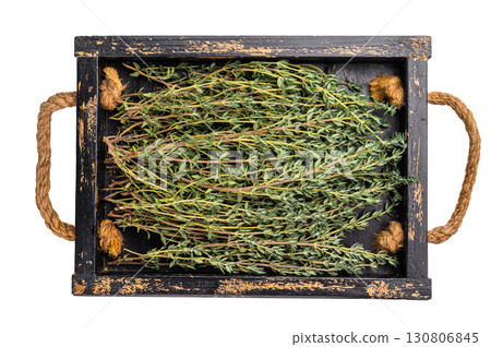 Fresh herb thyme sprigs in wooden tray isolated on white background. top view 130806845