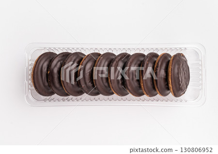 Jaffa cakes, Cookies covered with chocolate and filled with jam isolated on white background 130806952