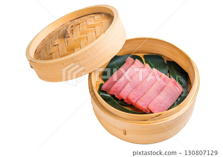 Artful presentation of fresh tuna sashimi, a deliciously healthy choice that delights the senses and pleases the palate. isolated on white background. top view 130807129