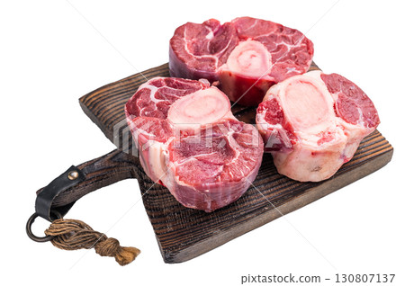 Fresh raw ossobuco Premium veal shank, ideal for slow cooking and creating hearty, comforting meals that impress. isolated on white background. top view 130807137