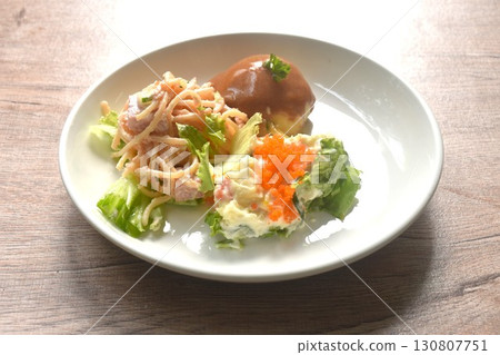 baking spaghetti slice ham pork with vegetable topping shrimp egg in mayonnaise cream sauce salad couple mashed potato on plate    130807751