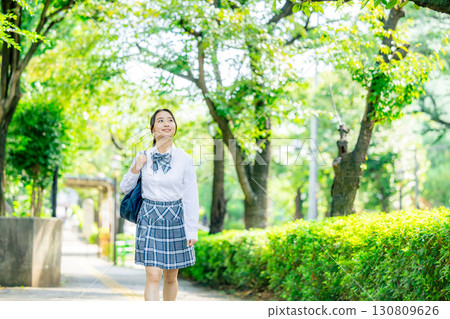 School girls with school bags School girls with school bags 130809626