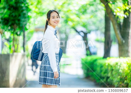 School girls with school bags School girls with school bags 130809637