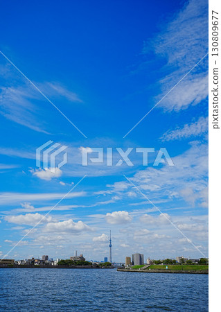Nakagawa River and Skytree under the clear blue sky Nakagawa River and Skytree under the clear blue sky 130809677