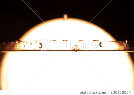 330.Water Droplets on Tube with Backlit Halo Effect 130810064