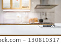White kitchen counter with cloth and blurred background for mockup 130810317