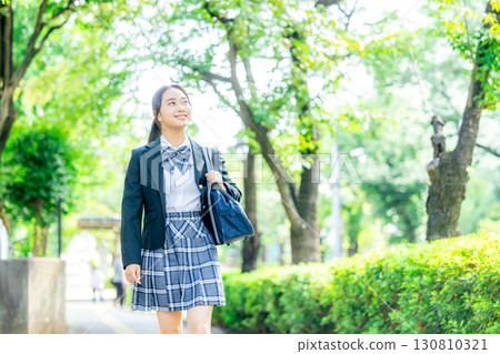 School girls going to school School girls going to school 130810321
