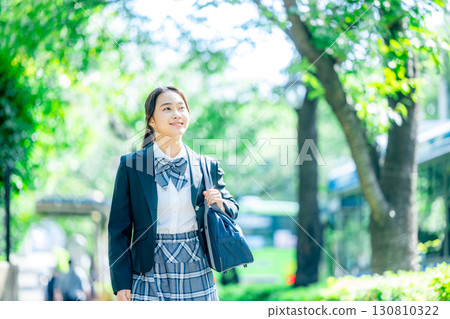 School girls going to school 130810322