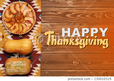 Cozy Thanksgiving celebration with pumpkin and apple pie on wooden table Cozy Thanksgiving celebration with pumpkin and apple pie on wooden table 130810529