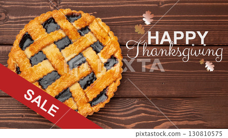 Thanksgiving sale with a decorated pie on a wooden table showcasing festive elements Thanksgiving sale with a decorated pie on a wooden table showcasing festive elements 130810575