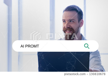 Man searching for AI prompts at a modern workspace in daylight while smiling and engaged in his task Man searching for AI prompts at a modern workspace in daylight while smiling and engaged in his task 130810678