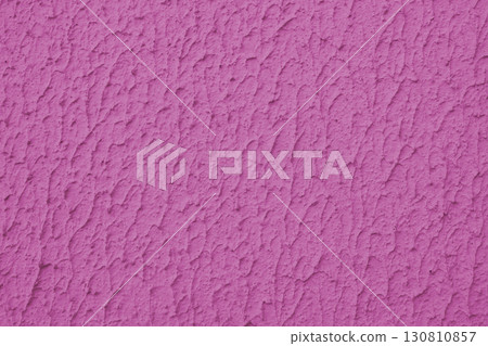 Rough pink colored concrete or plaster wall texture background Rough pink colored concrete or plaster wall texture background 130810857