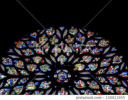 Stained glass rose window of Sainte-Chapelle, vibrant colors and intricate designs, interior 130811055