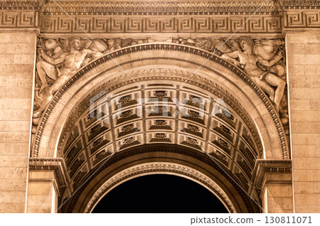 Architectural details of the ornate ceiling at the Arc de Triomphe in Paris during nighttime Architectural details of the ornate ceiling at the Arc de Triomphe in Paris during nighttime 130811071
