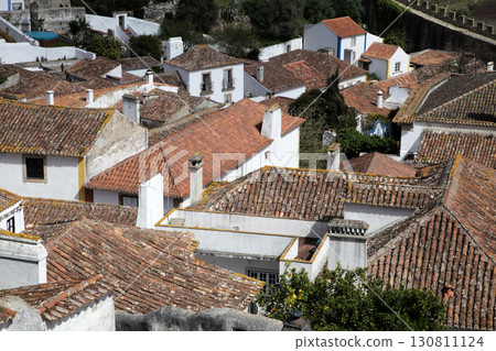 Obidos, Portugal - April 01, 2017 - Rooftops of Obidos Obidos, Portugal - April 01, 2017 - Rooftops of Obidos 130811124