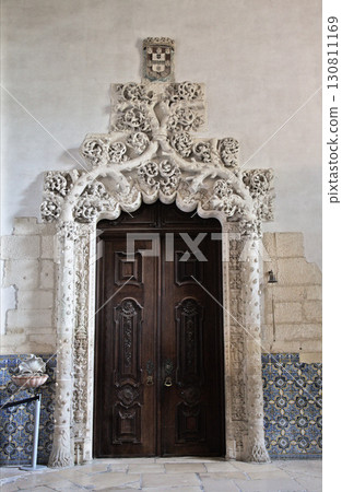 Intricate stone doorway of Monastery Santa Maria in Alcobaca, Portugal highlights craftsmanship Intricate stone doorway of Monastery Santa Maria in Alcobaca, Portugal highlights craftsmanship 130811169