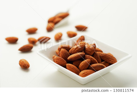 Roasted almonds (white background) 130811574