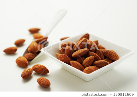 Roasted almonds (white background) 130811609