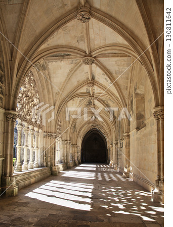 Intricate stone arches and columns in the beautiful cloister at Batalha monastery Intricate stone arches and columns in the beautiful cloister at Batalha monastery 130811642
