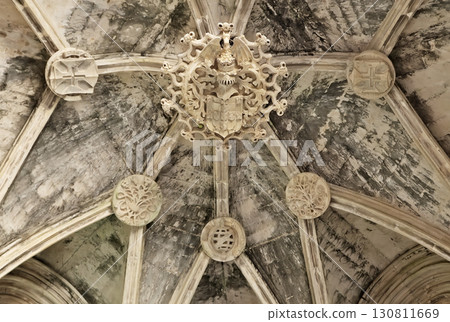 Elaborate ceiling details at Batalha Monastery in Portugal 130811669