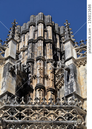 Intricate architectural details of Batalha monastery in Portugal's gothic style 130811686