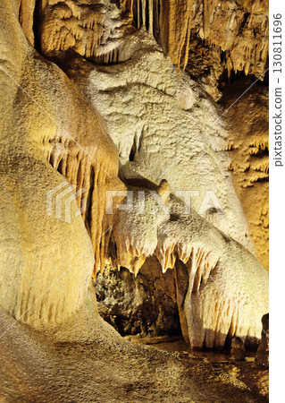 Exploring the intricate rock formations of Mira de Aire cave in Portugal Exploring the intricate rock formations of Mira de Aire cave in Portugal 130811696