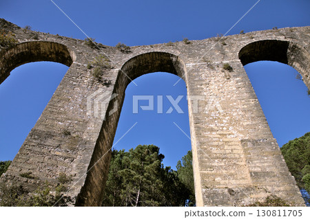 Exploration of Pegoes Aqueduct in Portugal's serene landscape Exploration of Pegoes Aqueduct in Portugal's serene landscape 130811705