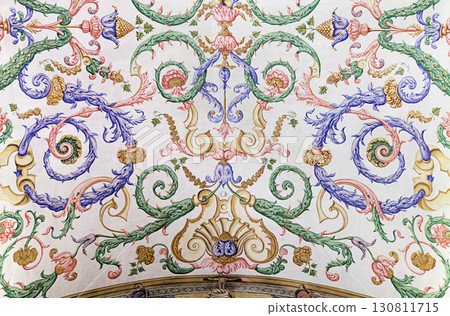 Coimbra, Portugal - April 3, 2017 - Intricate ceiling artwork at Sao Miguel Chapel in Coimbra University in Portugal Coimbra, Portugal - April 3, 2017 - Intricate ceiling artwork at Sao Miguel Chapel in Coimbra University in Portugal 130811715