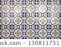 Blue and yellow Portuguese azulejo tiles with traditional patterns 130811731