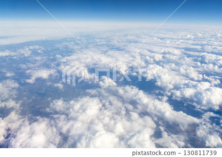 Clouds and blue sky, view from airplane Clouds and blue sky, view from airplane 130811739
