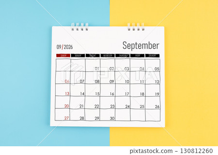 September 2026 calendar on blue and yellow color background, Flat lay. September 2026 calendar on blue and yellow color background, Flat lay. 130812260