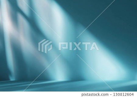 Minimal abstract background, light and shadow of tree leaves. Cosmetic product presentation. Premium podium. Pastel blue wall. Showcase display. Front view. Mockup ad. Turquoise jeans color 3d case. 130812604