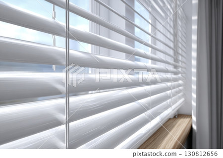Wooden blinds on large windows, sunlight. Elegant living room interior with windowsill, wood blinds. Motorized jalousie in the smart house. Modern window shutters, roller. Duo system day and night. 130812656