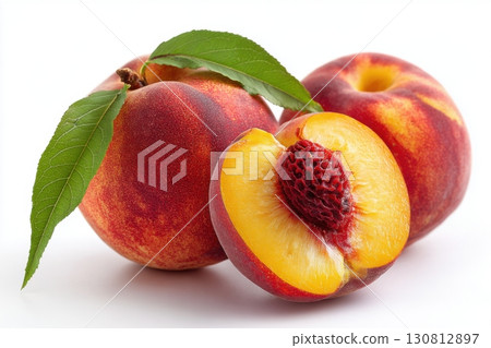Peach isolate. Fresh Peach slice. Peach with leaf. Full depth of field. Clipping path. Slices of ripe peaches. Composition of peaches, peach halves and slices with green leaves on a white background. 130812897